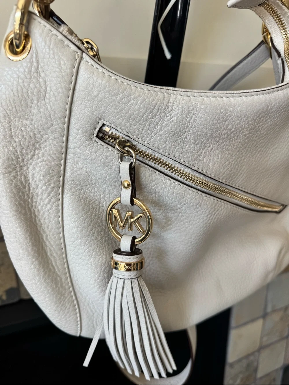 Michael Kors Cream Pebbled Leather Shoulder Hobo with Tassel and Gold Hardware